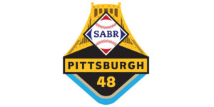 Logo for the SABR 48 event in Pittsburgh, featuring a shield shape with a golden top and black lower half. The logo includes a baseball and baseball diamond graphic, with the text 'SABR' and 'PITTSBURGH 48' prominently displayed.