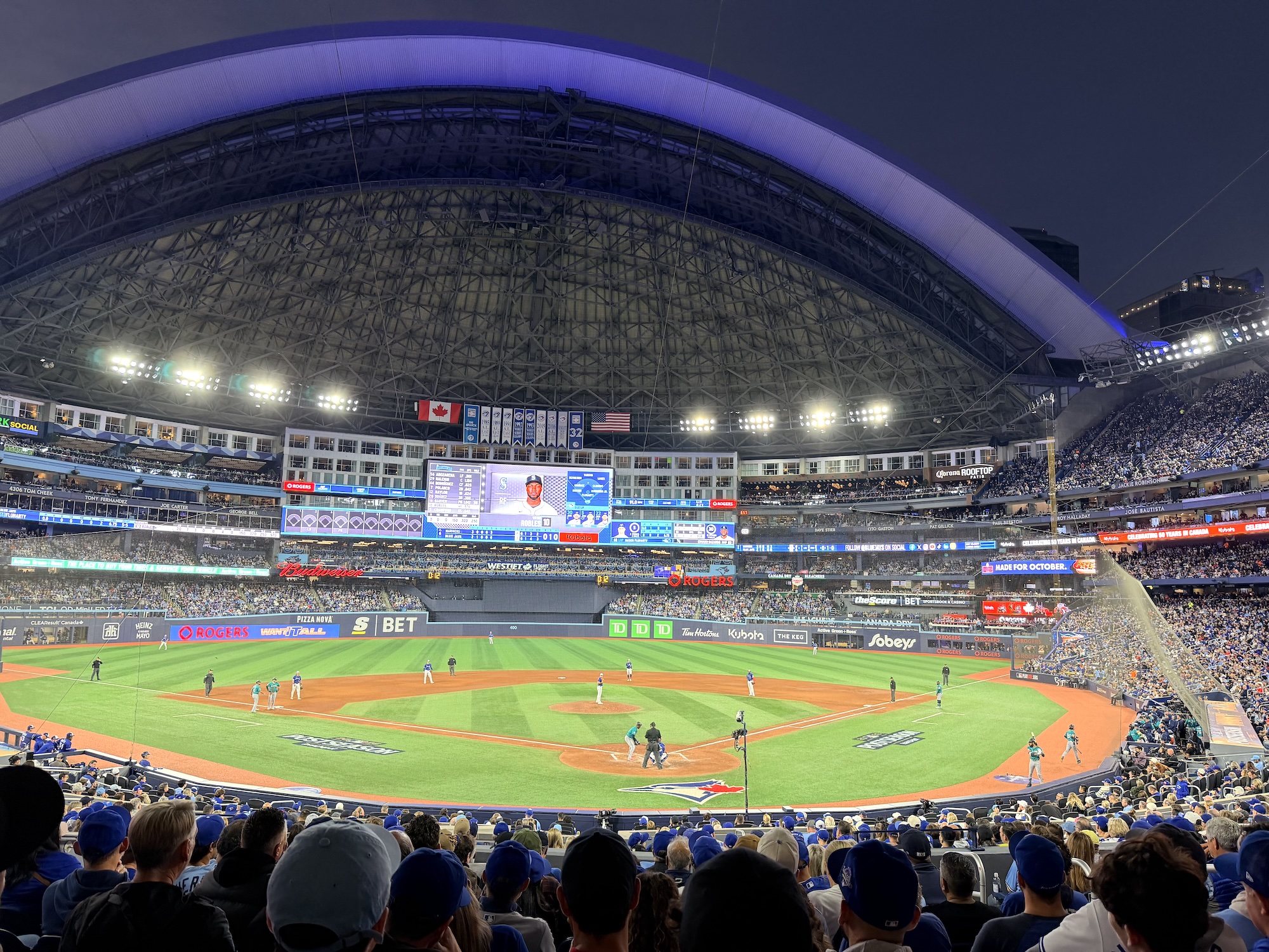 View of an opened roof at night at the Rogers Centre for 2025 ALCS, Game Two